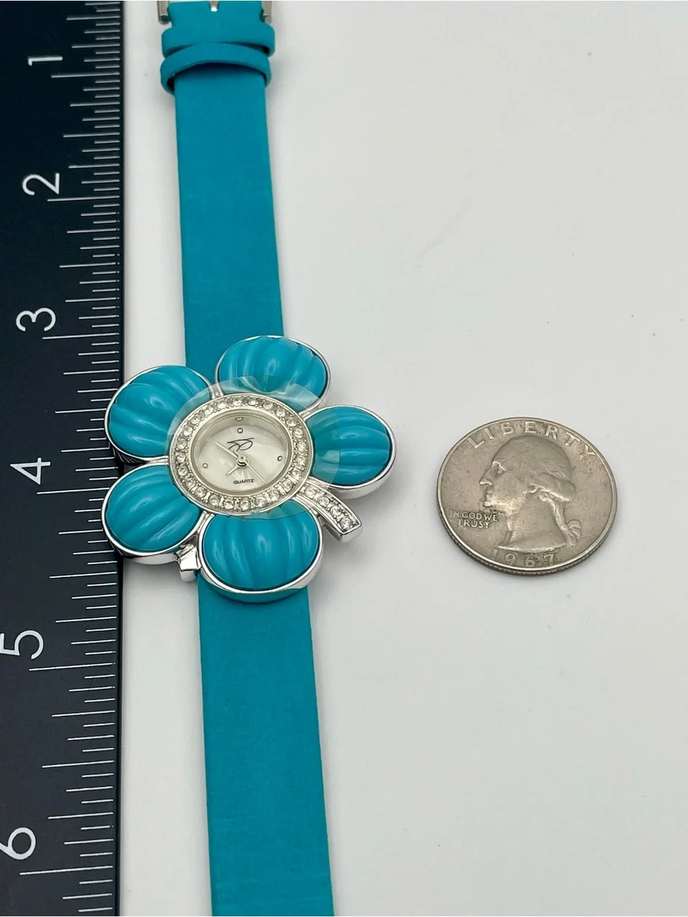Suzanne Somers Turquoise Flower Watch with Rhinestone Bezel. Blue Leather Band